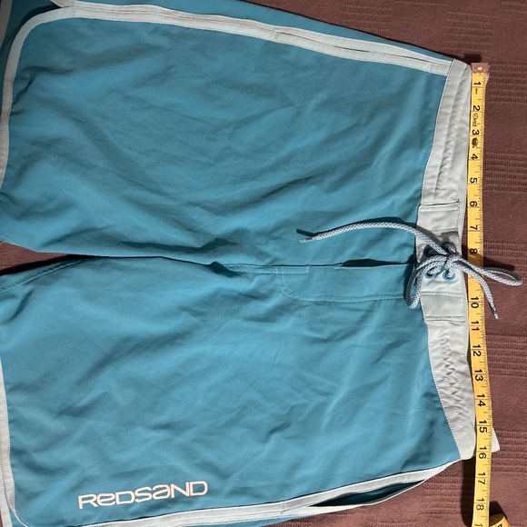 Reds and  Boardshorts - Picture 1 of 5
